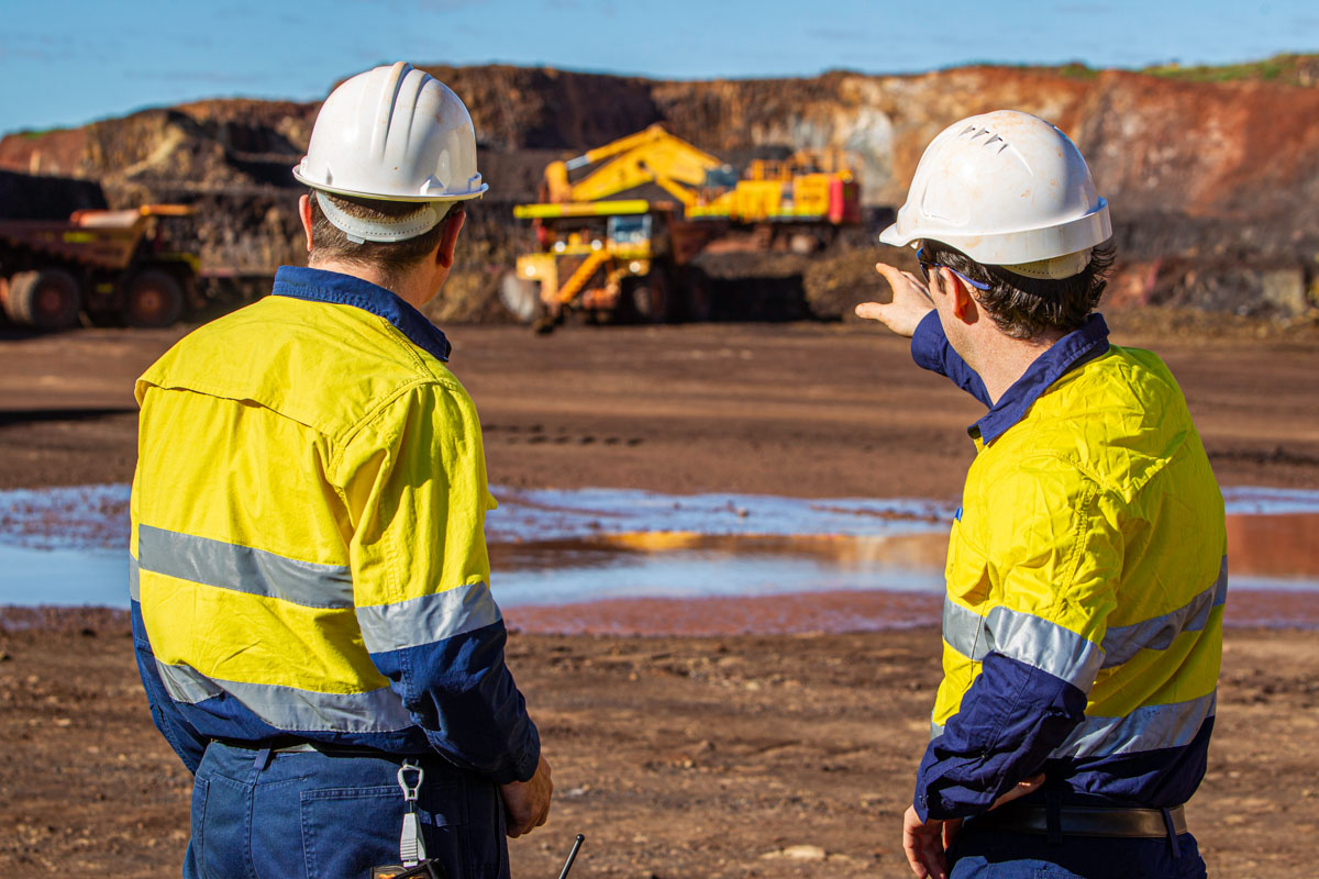 Workers,Discussing,On,Going,Job